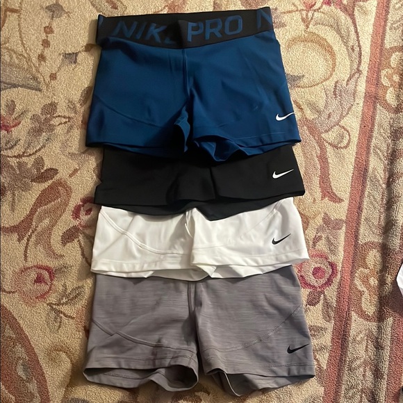Nike Women's Athletic Shorts - Blue, Black, White, Gray
$32 for all 4 - Picture 1 of 3